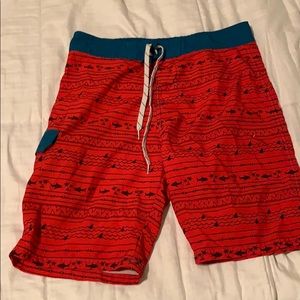 Palm tree and shark swim trunks